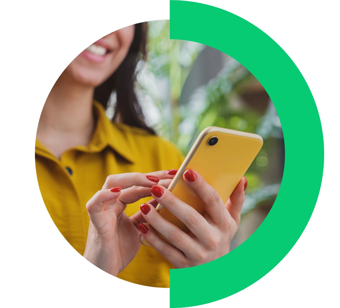 Woman interacting with Go To Training using their phone while on the go.