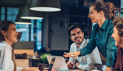 Creative professionals collaborating in coworking space