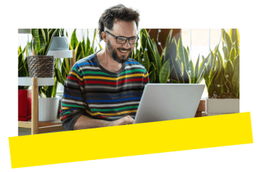 Professional using laptop computer and GoTo software to collaborate with team from home.